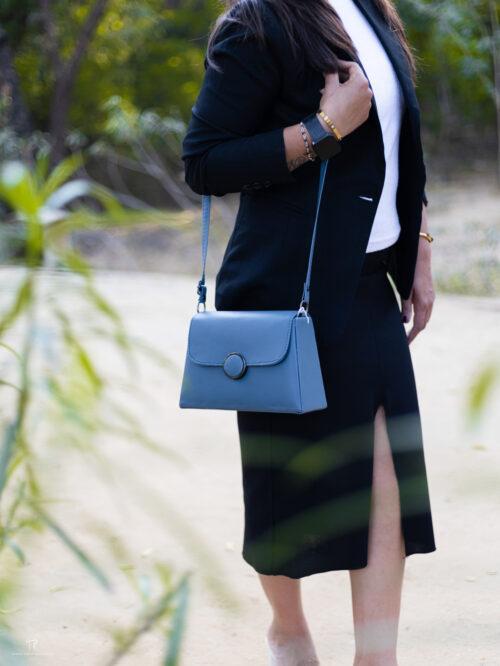 Elegant Blue Sling Bag with Round Metal Accent - Image 2