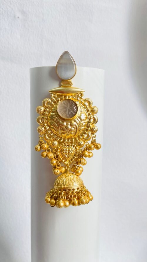 Timeless gold-plated jhumka earrings with intricate detailing and a regal touch.