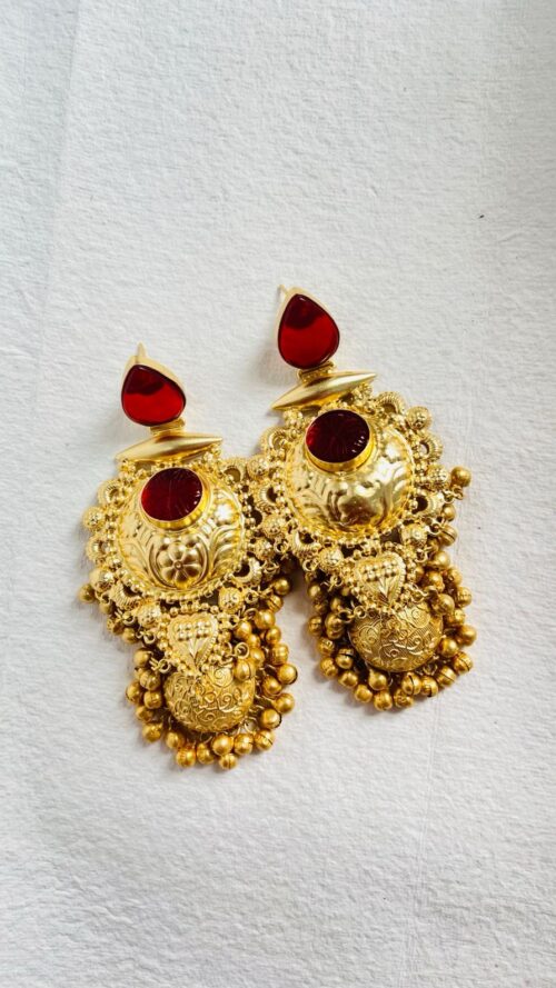 Timeless gold-plated red jhumka earrings with intricate detailing and a regal touch. - Image 3