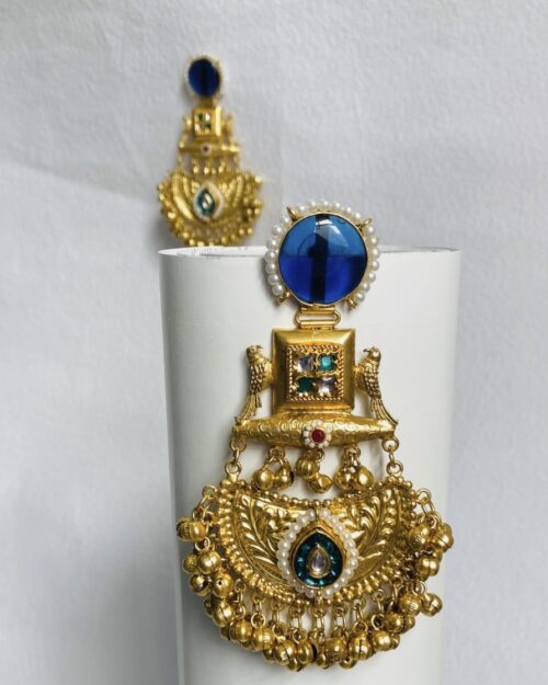 Royal-inspired gold-plated statement brooch with intricate detailing and pearl embellishments. - Image 3