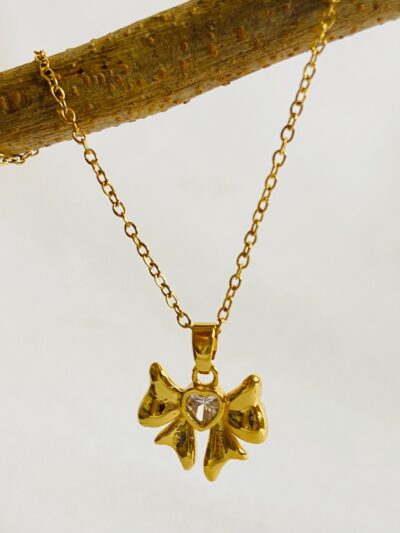 Tie your look together with golden grace and a touch of sparkle (small size bow pendant)
